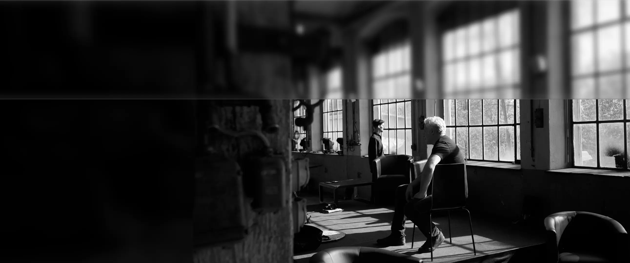 Founders' photo inside an old Swiss factory.